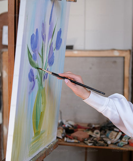 Painting a picture with a brush